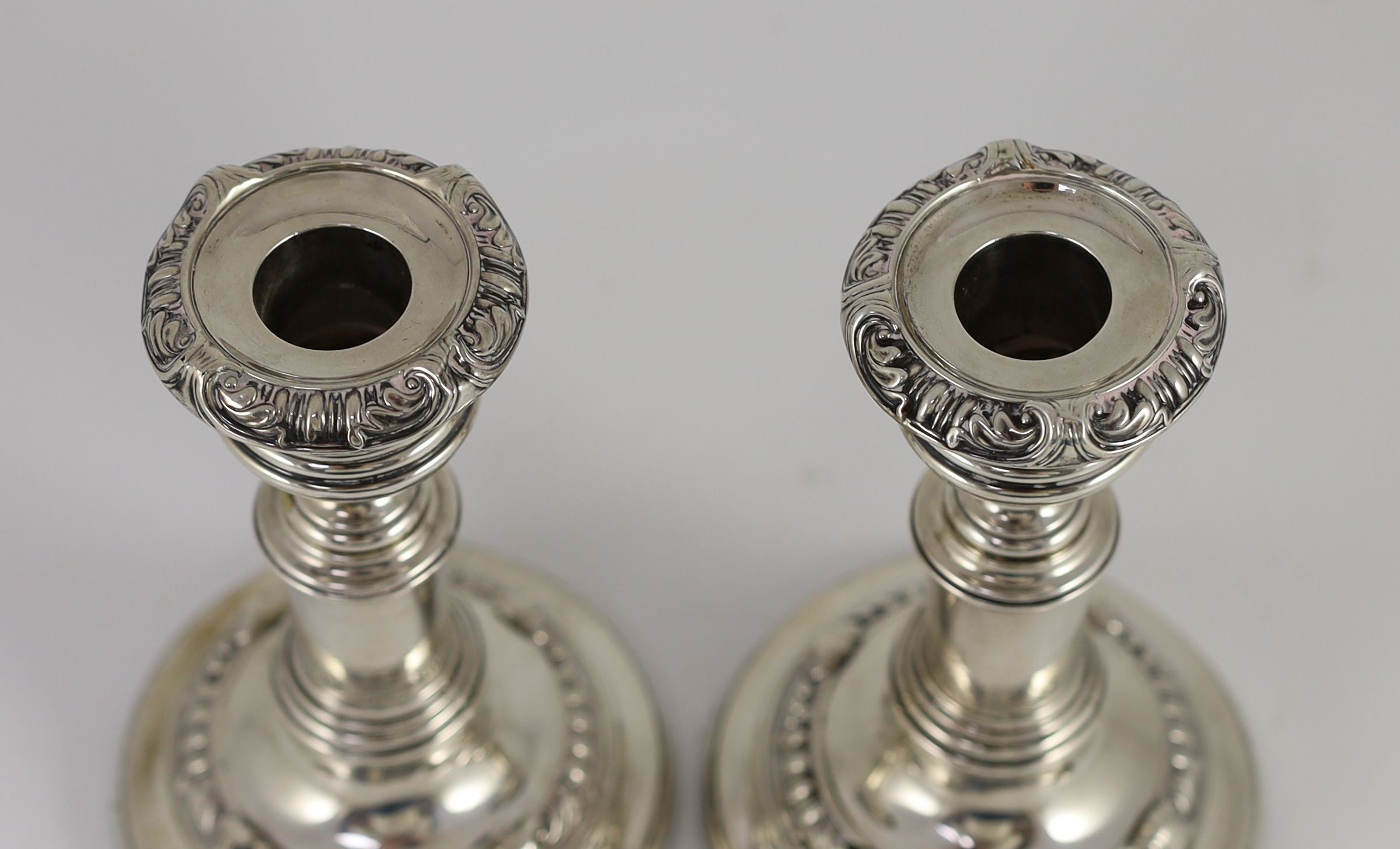 A pair of George III silver telescopic candlesticks, by S.C. Younge & Co